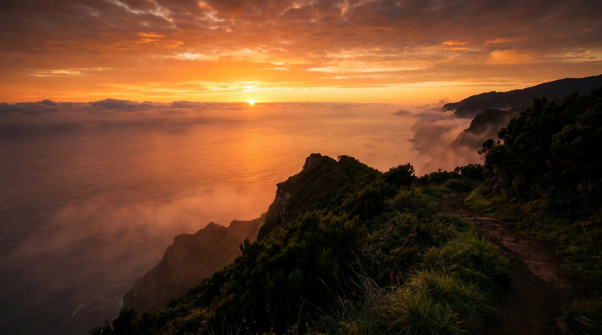 Boa Morte west-facing viewpoint with Atlantic sunset arc, Madeira